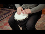 Meinl Headliner Series Djembe Drum 10" HDJ1-M being played to demonstrate its deep bass tones, clear open tones, and articulate slap sounds for drum circles, music education, group drumming, and recreational percussion playing.