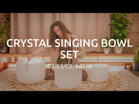 crystal singing bowl being played with a singing bowl mallet to demonstrate clear sustained tones and smooth resonance for meditation and sound therapy
