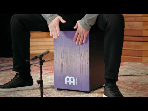 Performance video of the Meinl Snare Cajon Headliner Series Lilac Purple Fade MCAJ100BK-LPF — musician playing the cajon, demonstrating rhythm, technique, and professional percussion sound.
