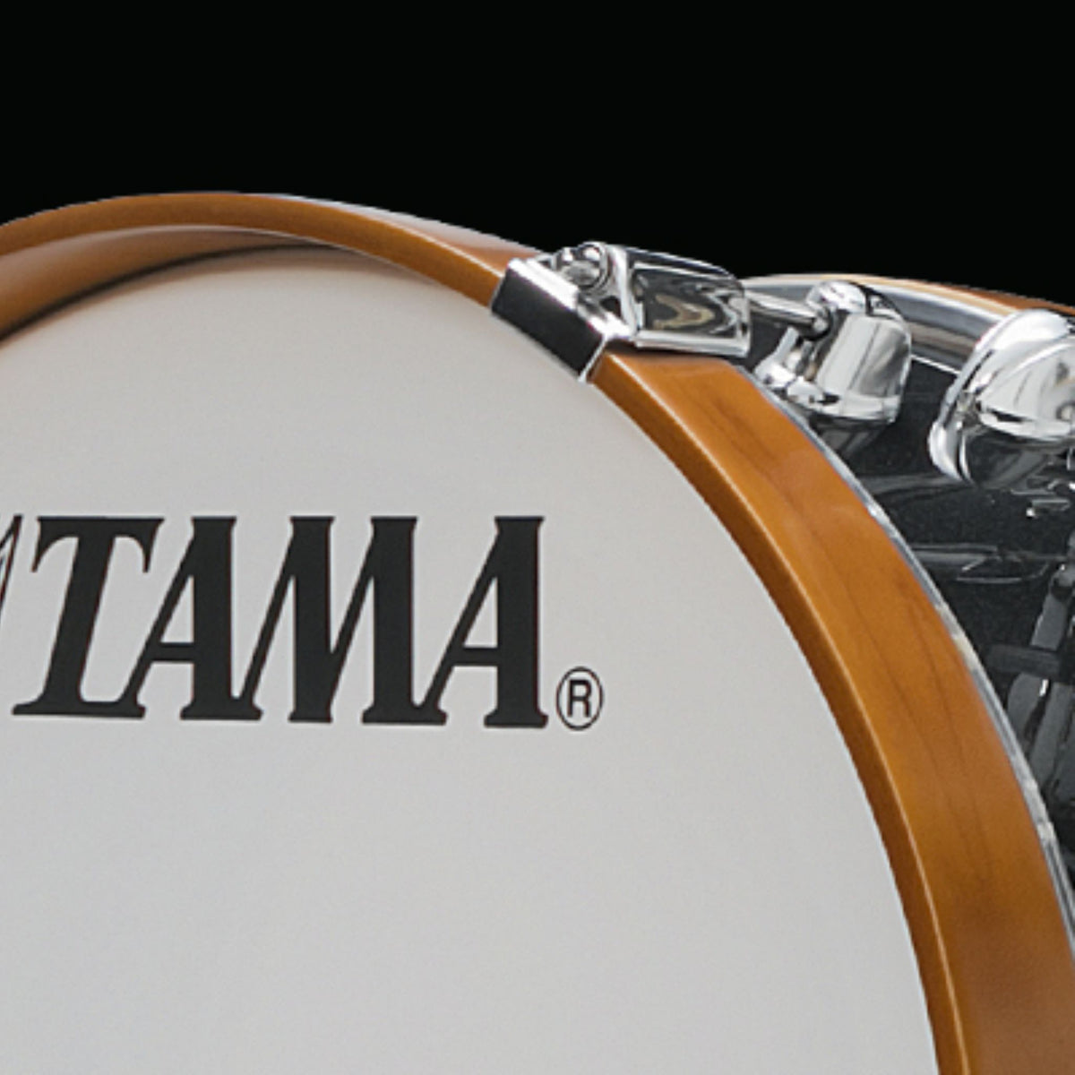 Close-up front and side view of the Tama Club-JAM Mini 18" x 7" bass drum in Charcoal Mist showing its compact shallow-shell design.